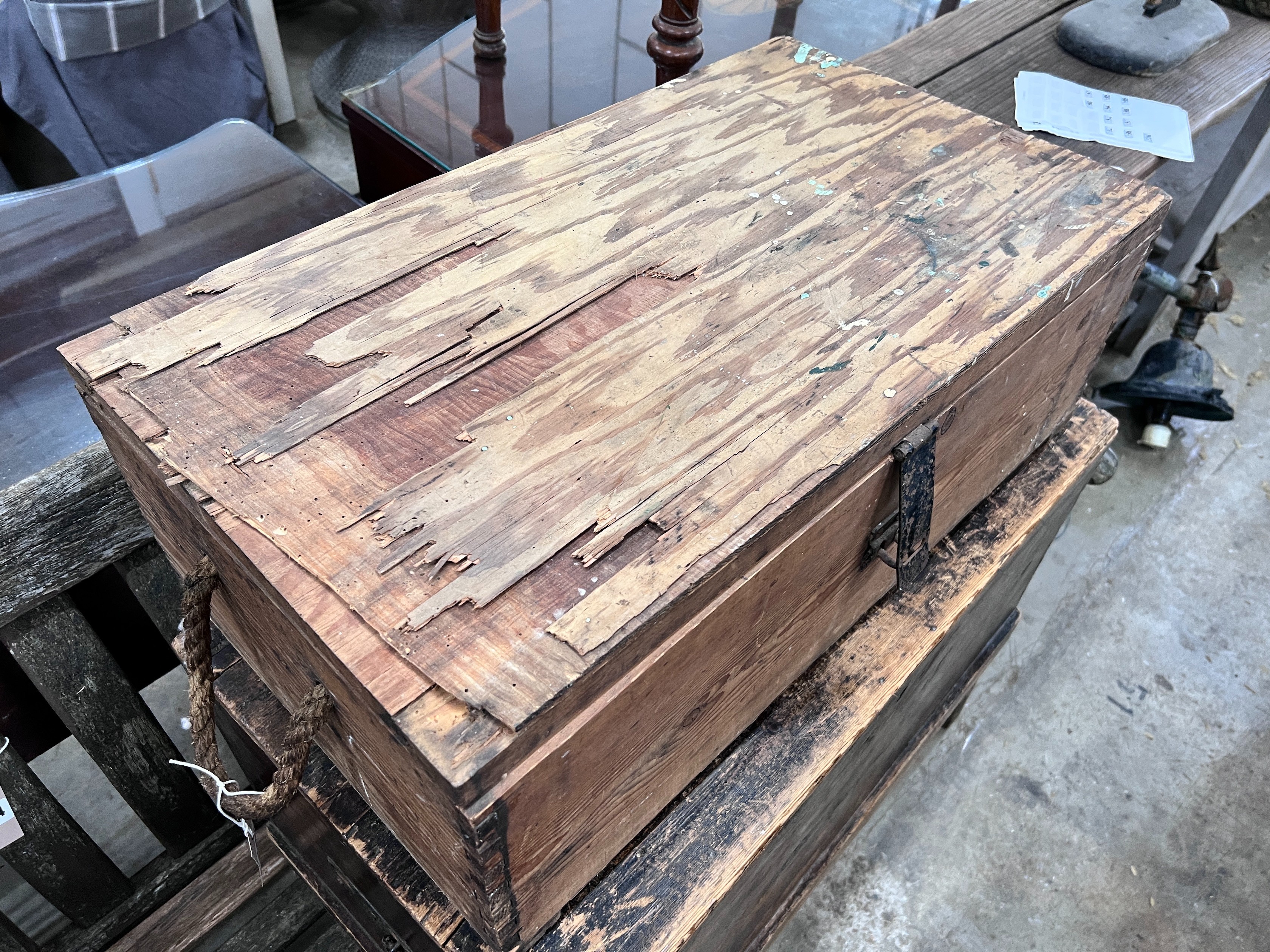 A stained pine trunk, width 77cm and a pine and plywood trunk, width 71cm *Please note the sale commences at 9am.